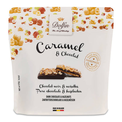 Ylellinen tumma suklaa, jossa rapeat hasselpähkinät ja luonnollinen vanilja luovat täydellisen ylellisen makuelämyksen.