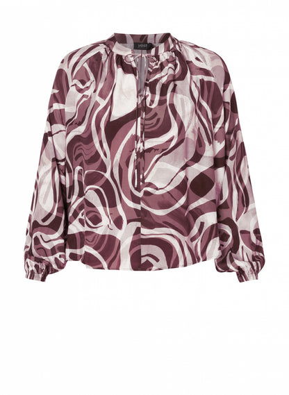 Viskoosipaita leveillä hihoilla ja nyörillä pyöreässä pääntiessä. Orgaaninen kuosi, läpikuultava materiaali, naisellinen ja rento tyyli.