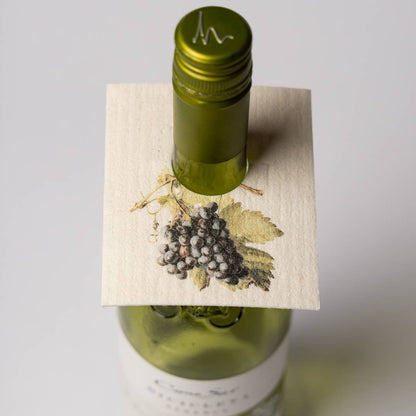 Viinipullon kaulus Viinirypäleet – ekologinen, 100 % biohajoava kaulus, joka suojaa pullon ja on helppo puhdistaa käytön jälkeen.