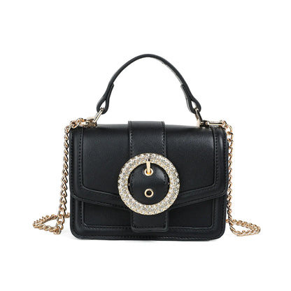 FELICIA – juhlava pikkulaukku isolla glitterisoljella, keinonahkaa ja kullanväriset metalliyksityiskohdat