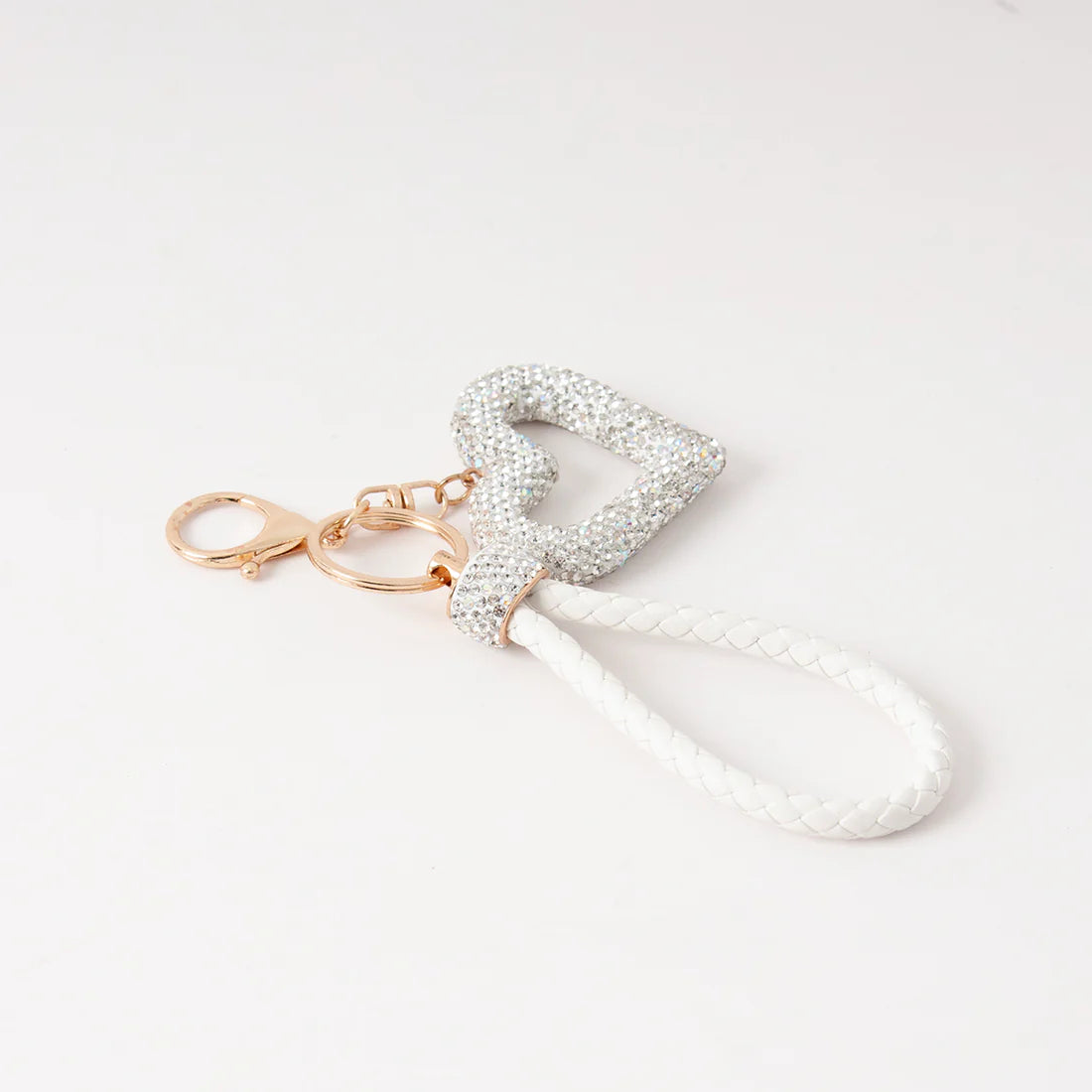 Säihkyvä  Sydän laukkukoru strasseilla ja kullanvärisillä yksityiskohdilla