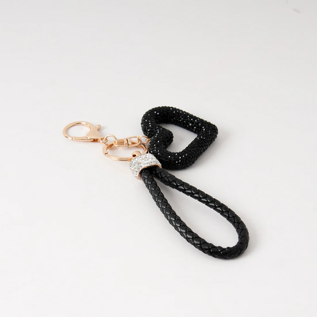 Säihkyvä  Sydän laukkukoru strasseilla ja kullanvärisillä yksityiskohdilla