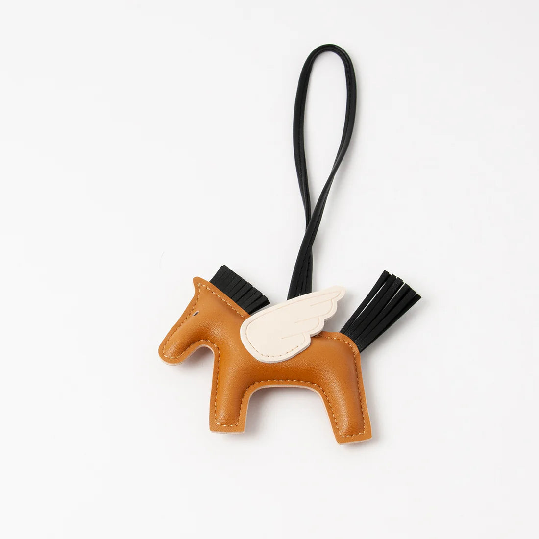 Rosenvingen Pegasus-laukkukoru, keinonahkainen siivekäs koriste kiinnityslenkillä laukkuun tai avaimiin