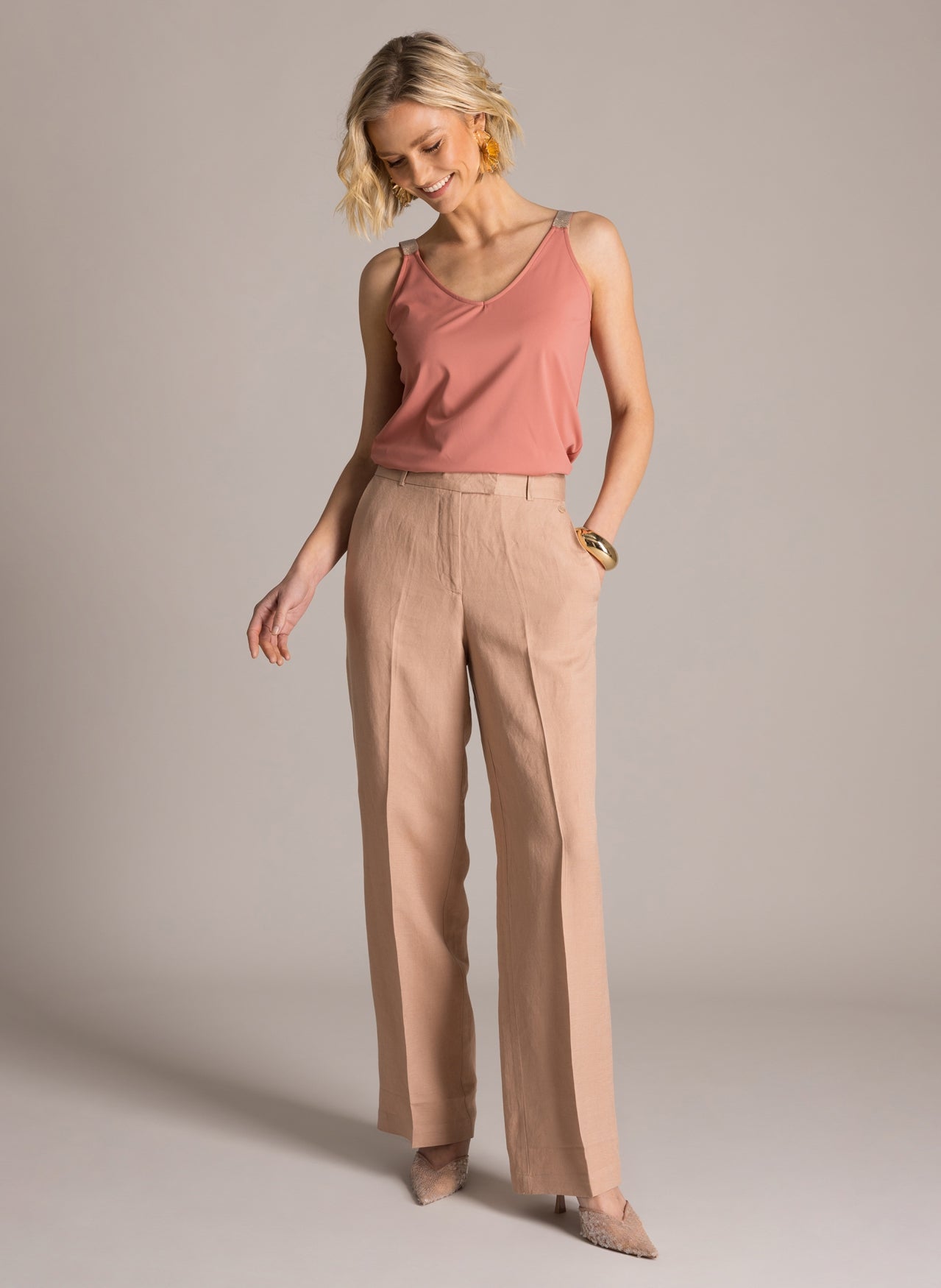 Glitterolkaiminen toppi joustavasta kankaasta, käännettävä V- tai pyöreällä pääntiellä