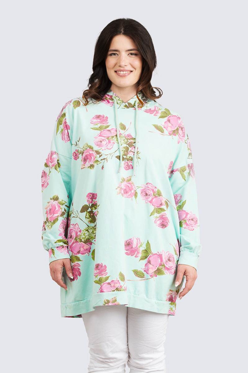 Naisten Tamara-ruusuhuppari, pehmeää 100 % puuvillacollegea, reilumpi mitoitus, edessä kaunis ruusuprintti, sivutaskut ja säädettävä huppu kiristysnyörillä