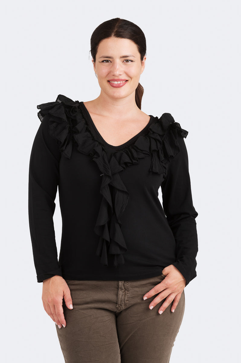 Rimpsutrikoopusero – Kotirouva, joustavaa trikoota, kevyet kangasröyhelöt ja V-pääntie.