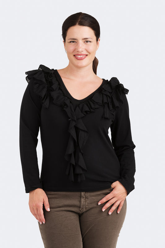 Rimpsutrikoopusero – Kotirouva, joustavaa trikoota, kevyet kangasröyhelöt ja V-pääntie.